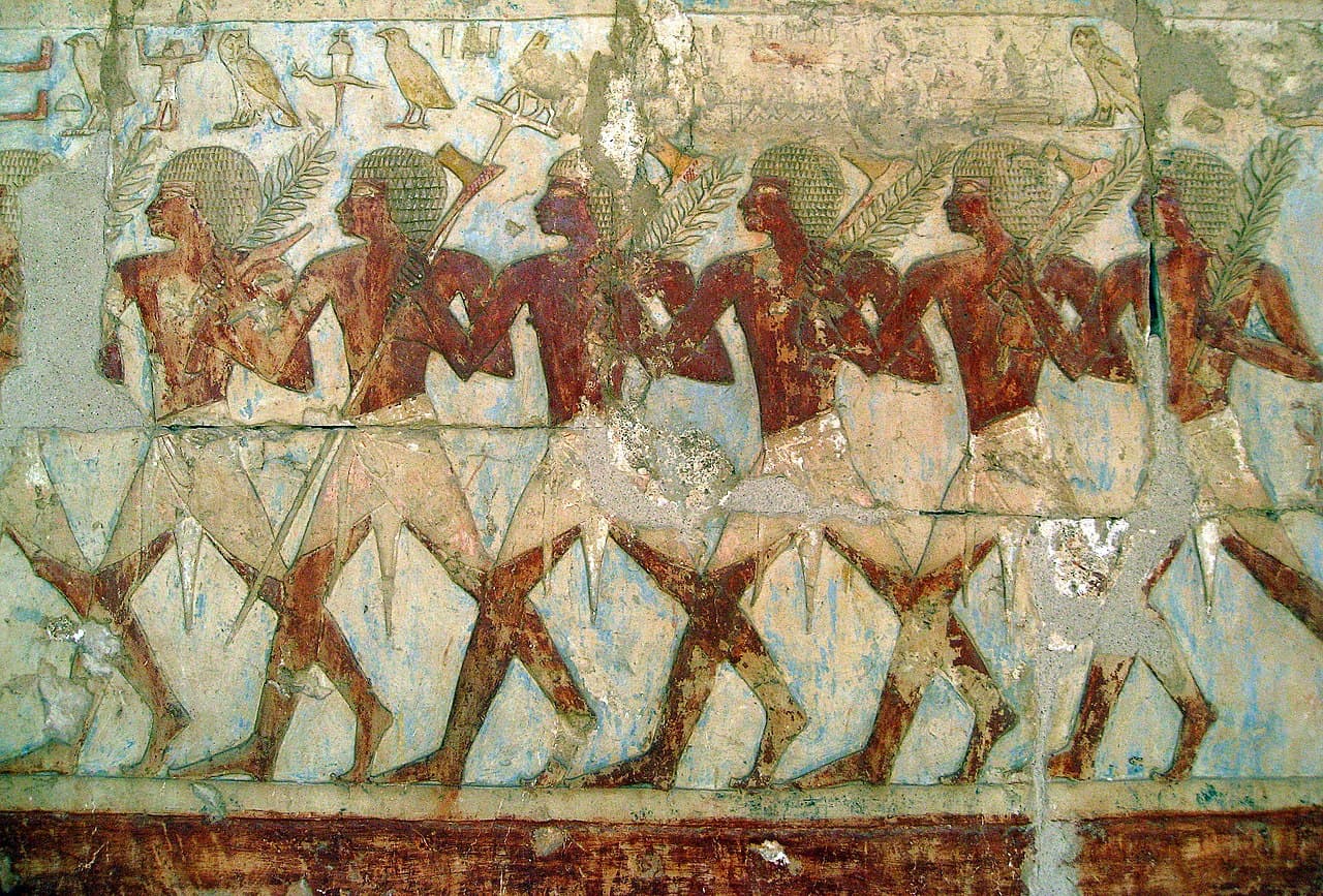 The Punt expedition relief at Deir el-Bahari. Egyptian boats are being loaded with myrrh trees, ivory, and live baboons.