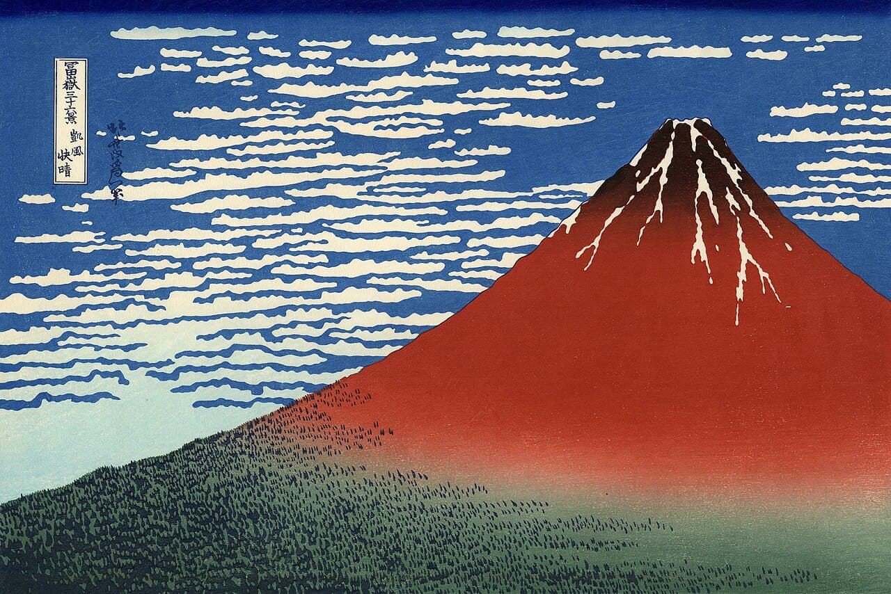 Red Fuji (Gaifū kaisei), another print from the Thirty-six Views series. Prussian blue, applied at the top of the sky, was the chemistry that made these prints possible.