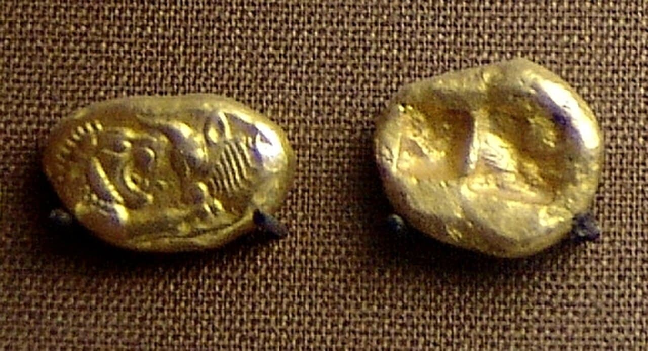 An electrum coin of Lydia, around 600 BCE. The earliest known coined money emerged simultaneously in three regions — Lydia, archaic Greece, and the Chinese kingdom of Chu.