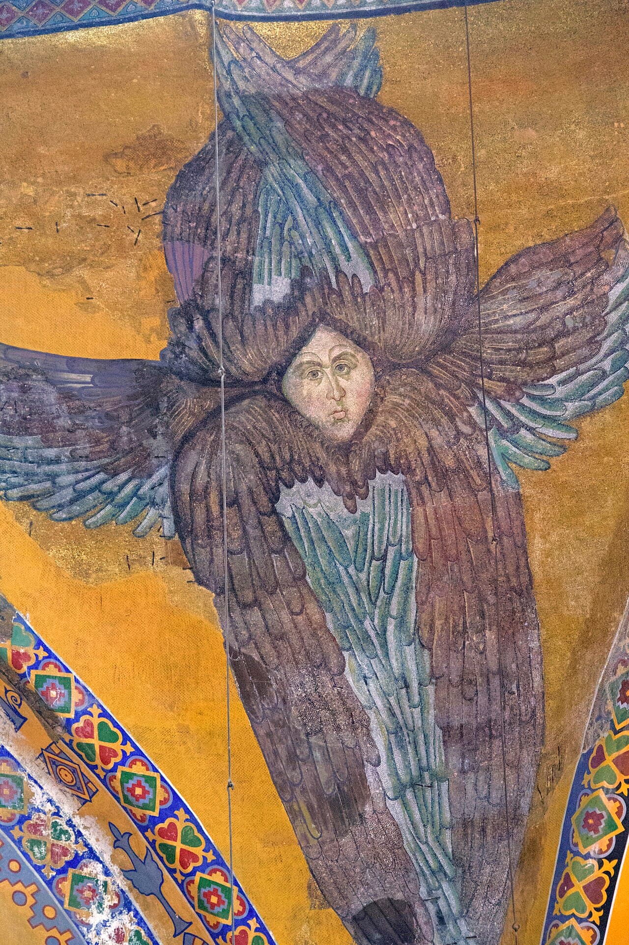 A pendentive of the Hagia Sophia, with a 9th-century mosaic seraphim revealed in 2009 after centuries under plaster. The pendentive transitions geometrically from a square plan to a circular dome base.