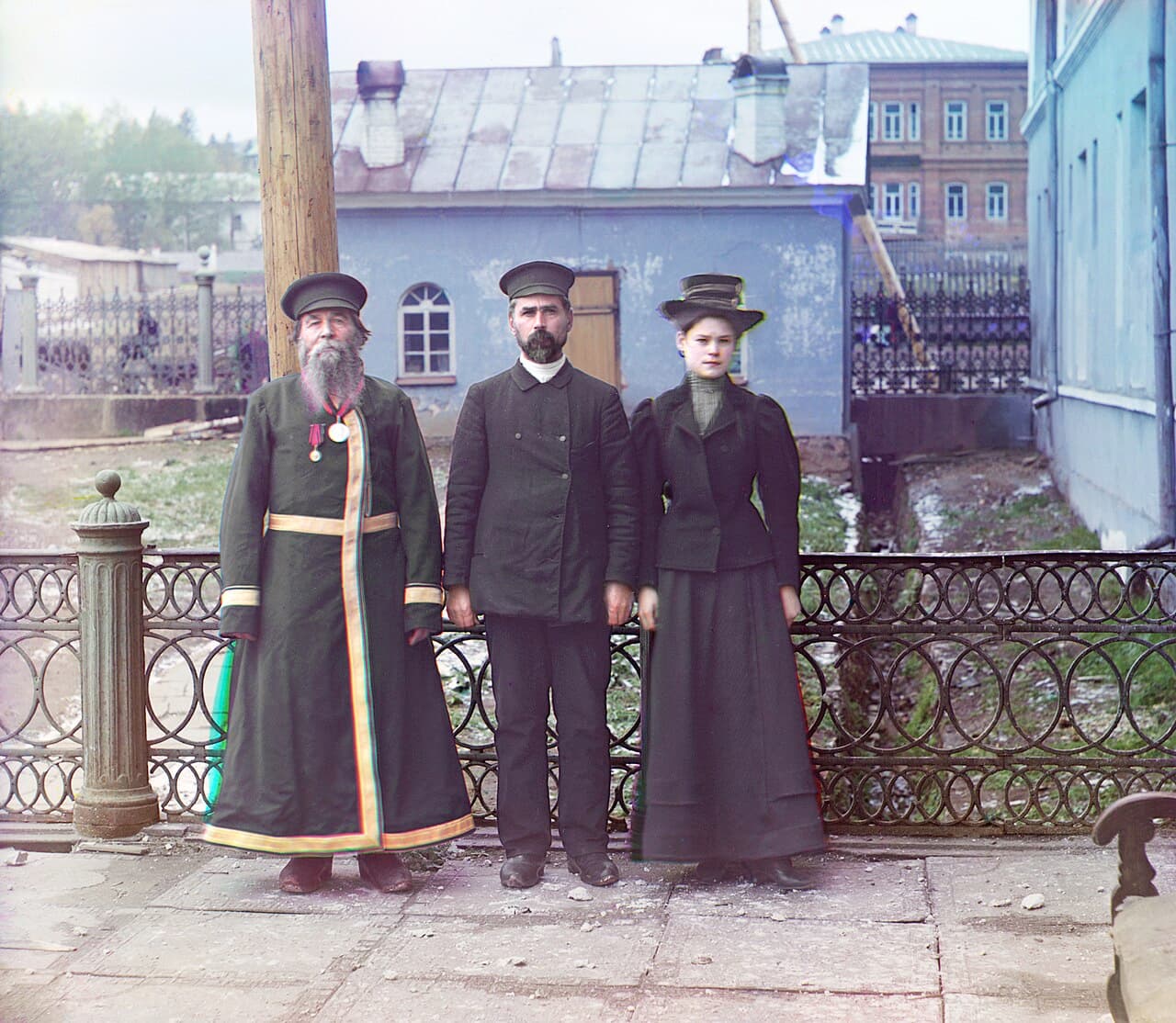 Three generations of the Kalganov family at the Zlatoust iron works in the Urals, 1910. The grandfather, his son, and his granddaughter — all photographed in colour.