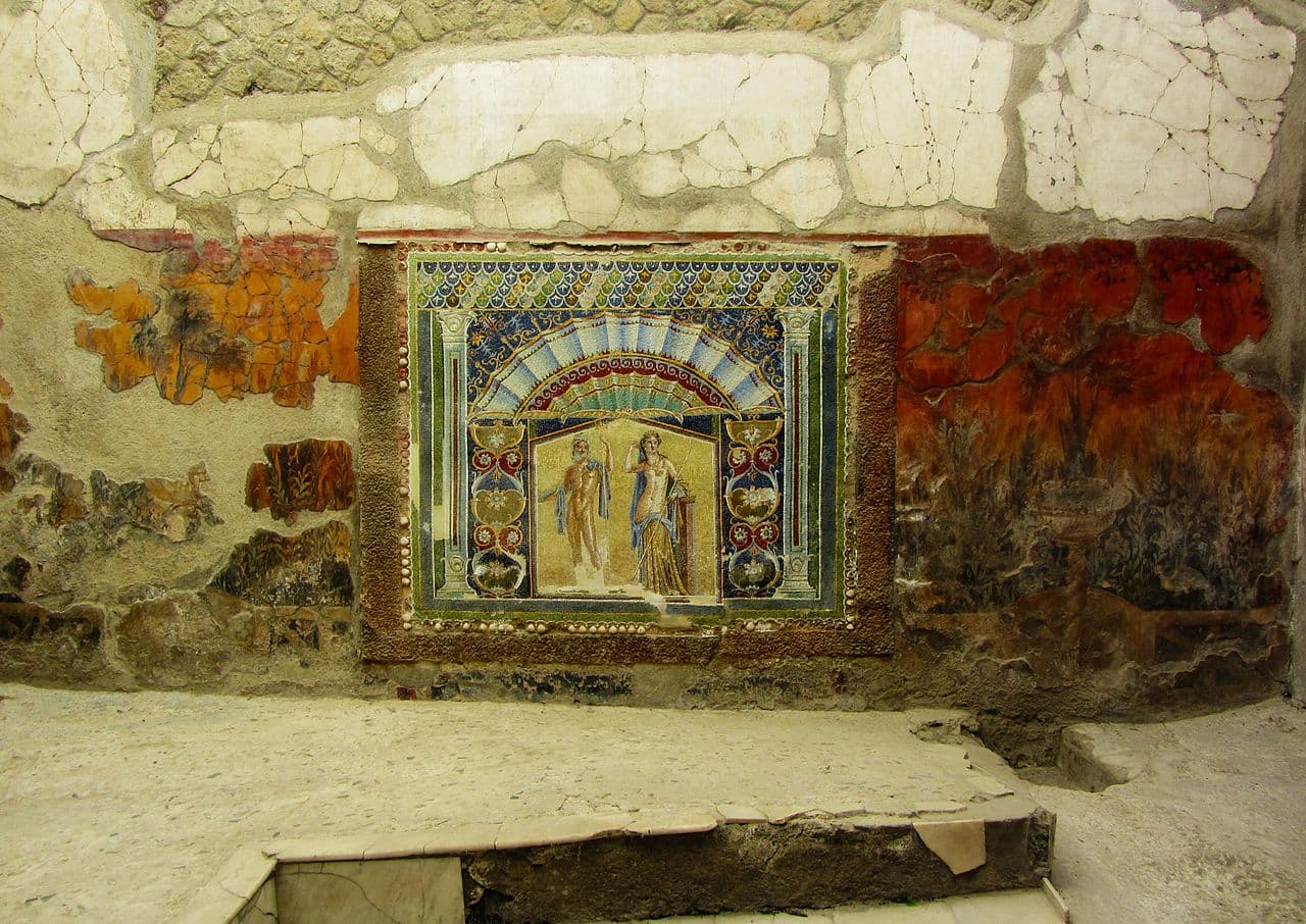 The Villa of the Papyri. The library — possibly the working collection of the Epicurean philosopher Philodemus of Gadara — was buried by pyroclastic surge in 79 CE.