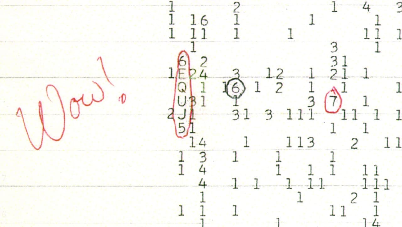 The original Big Ear printout. Jerry Ehman's red-pen annotation circles the 6EQUJ5 reading — 72 seconds of intensity profile from the direction of Sagittarius, never repeated.
