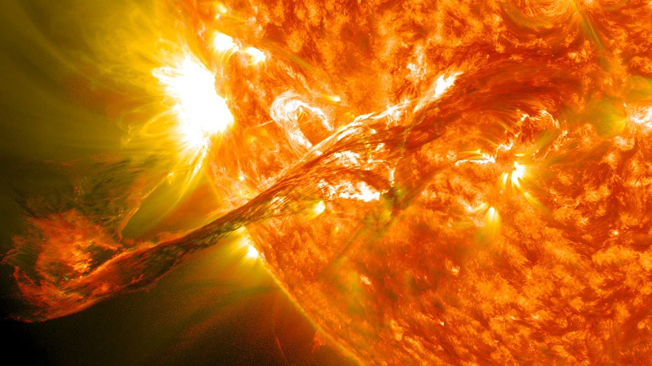 A coronal mass ejection imaged by the SOHO spacecraft. The Carrington event's CME crossed the Earth–Sun distance in roughly 17.5 hours.